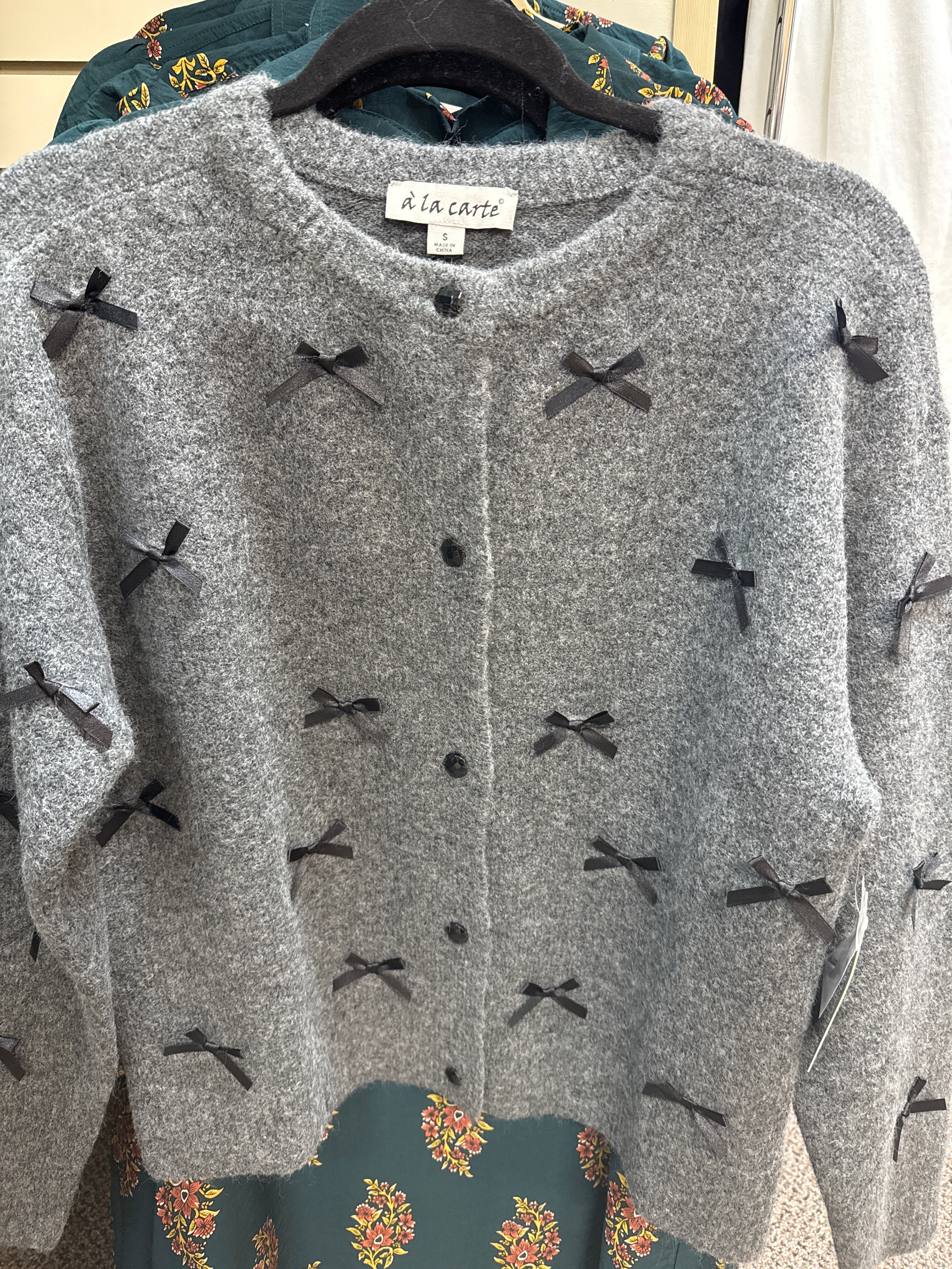 CARDIGAN WITH BOWS
