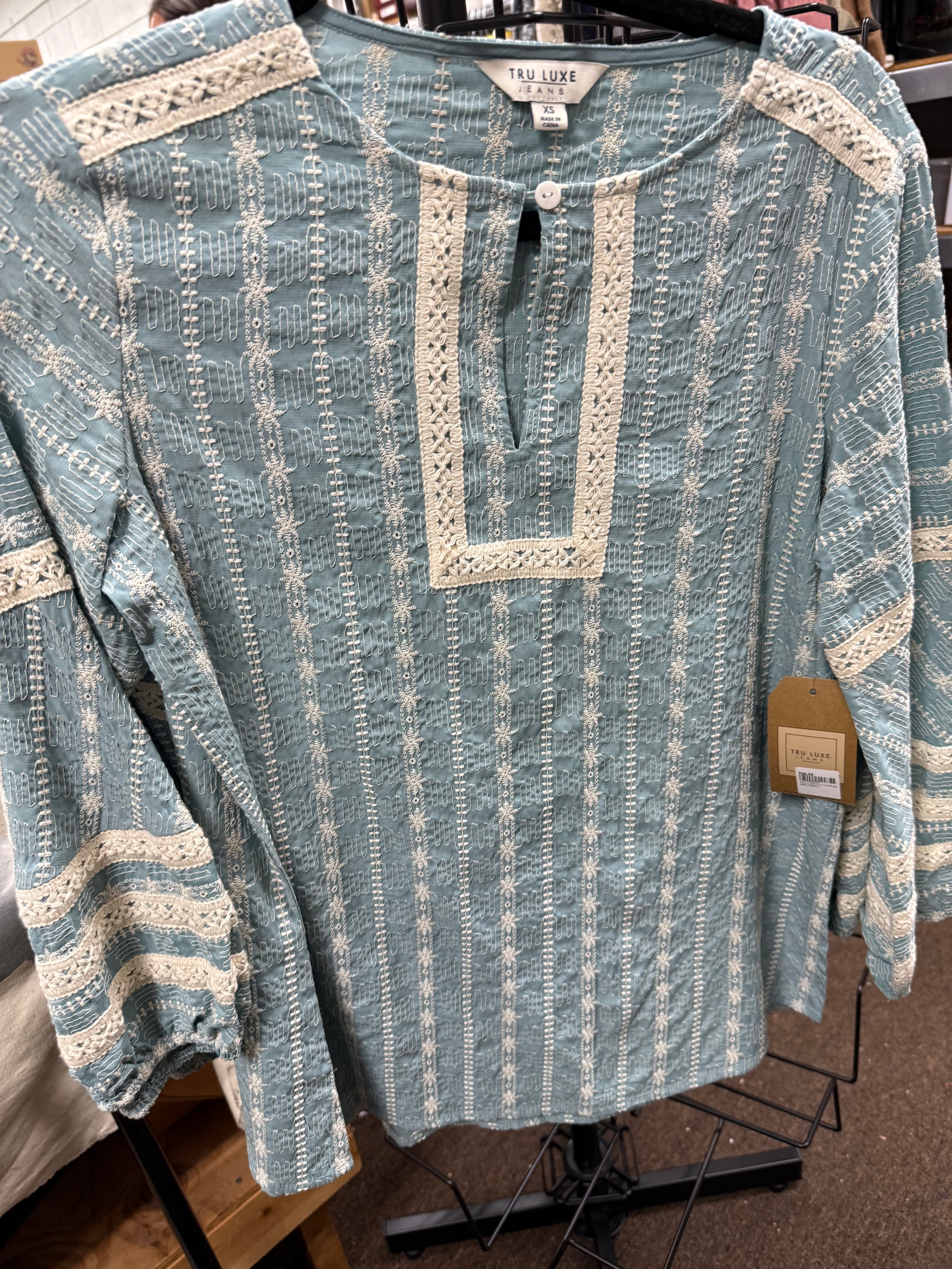 TRU LUXE ALL-OVER EMBROIDERED PEASANT TOP